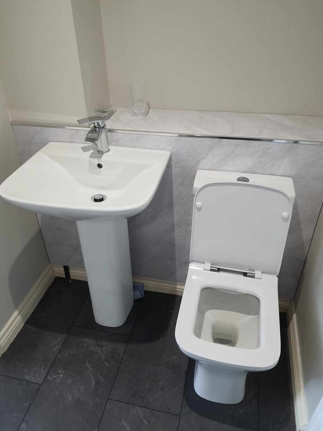 Finished cloakroom with new basin and toilet