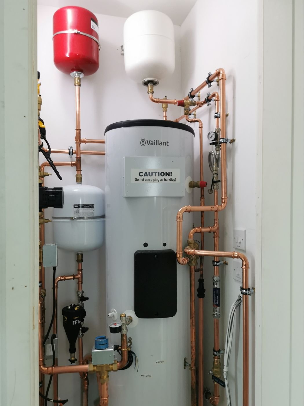 Unvented hot water cylinder and copper pipework